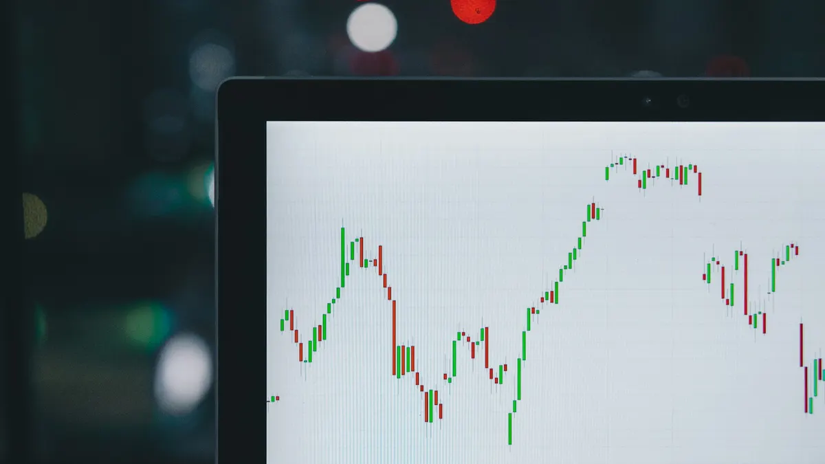 画面に表示された価格推移のチャート。上下する波形のイメージ。
